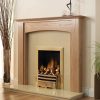 Fire burns in gold coloured gas fireplace with neutral polished stone surround