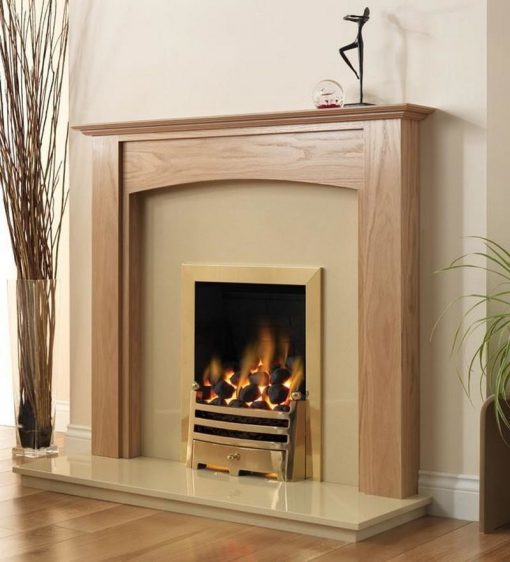 Fire burns in gold coloured gas fireplace with neutral polished stone surround