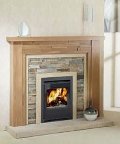 Electric fire set in coloured brick surround