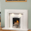 A fire burns in a smart metal fireplace with white surrounds