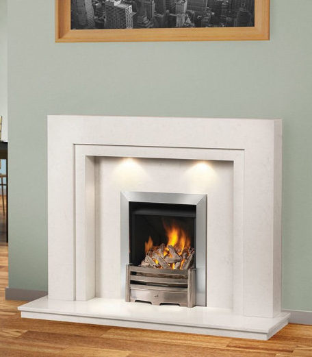 A fire burns in a smart metal fireplace with white surrounds