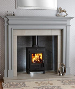 wood burning stove in dark tile fireplace