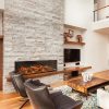 Landscape style in-wall electric fire with log bed in contemporary living space