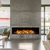 Widescreen style electric fire mounted in concrete wall with log bed