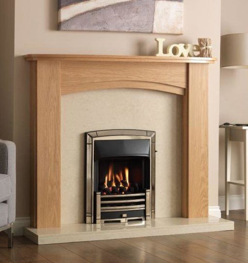 Living room scene with gold and black fireplace under wooden mantel