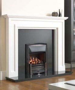 A modern polished black fireplace under white mantel in living room