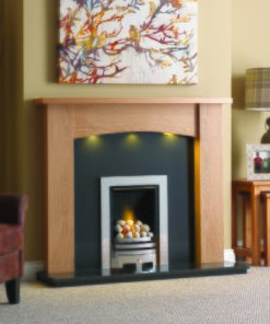 Simple and solid mantel with LED lighting over a simple modern fireplace