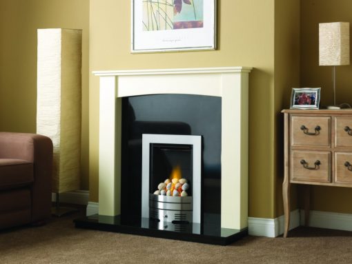 Smart cream coloured surround over simple fireplace in silver finish