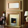 Contemporary oak mantel and mirror over gas fireplace insert