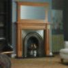 Victorian style timber mantel with mirror over large fireplace