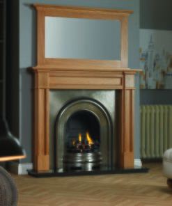 Victorian style timber mantel with mirror over large fireplace