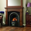 Arched cast iron fireplace set in victorian style dark wood mantel