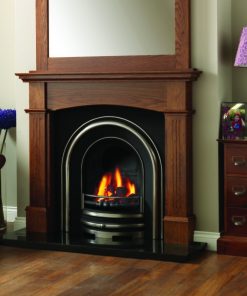 Arched cast iron fireplace set in victorian style dark wood mantel