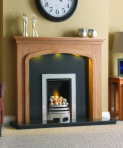 Chic silver fireplace below classic timber mantel with LED lighting