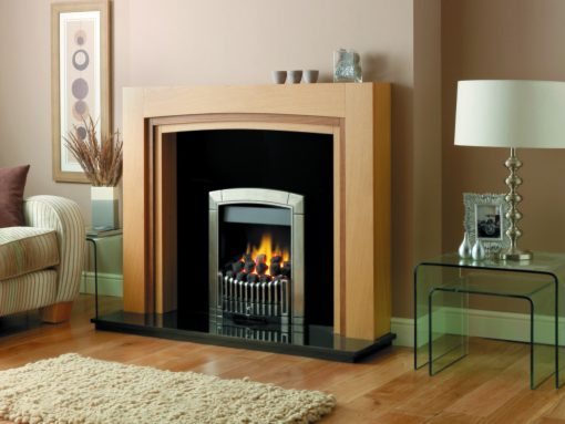 Timber mantel with subtle arch mimics shape of fireplace insert beneath