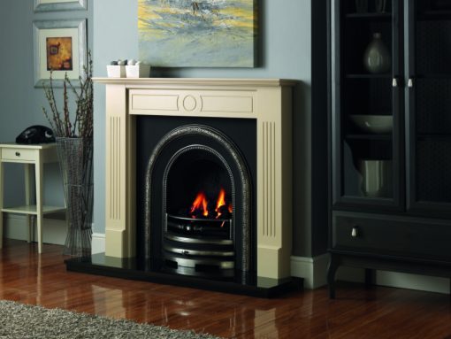 Victorian style fireplace with embellished arched fireplace