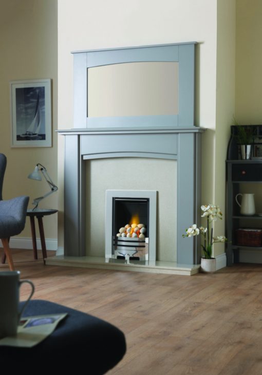 Simple grey fireplace in light blue surround with mirror in country home