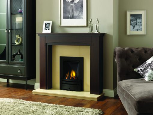 Smart and simple cast iron fireplace with dark wood surround